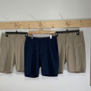 3 pair Greg Norman Collection Men's Flat Front Shorts in Navy and Khaki